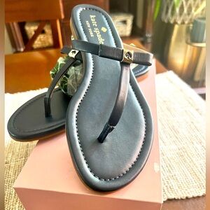 Kate Spade Navy Leather T-Strap Sandals with signature spade Gold Accent